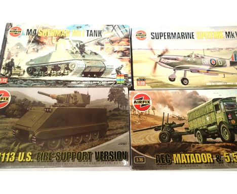 Four Airfix 1:72 scale military/aircraft kits, Airfix: Panther and Spitfire VB, Heller: ME Taifun, and Landing craft. P&amp;P