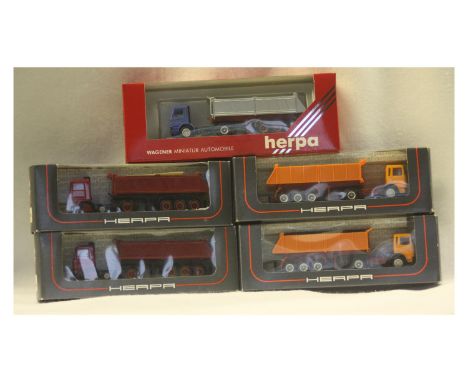 H0 Vehicles, 2x Herpa 820005 MAN articulated dump truck, brown chassis orange body, 2x Herpa 838000 Volvo F12 articulated dum