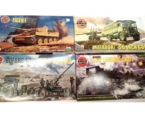 Four Airfix 1:72 scale military kits, Landing craft, Matador and gun, Bofors gun and tractor, Tiger tank, all excellent/as ne