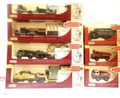 Seven trackside OO scale vehicles including Heavy Haulage x4, mostly in excellent condition and boxed. P&amp;P Group 2 (£18+V