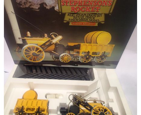 Hornby 3 1/2 gauge Live Steam G100 Stephensons Rocket in excellent condition, appears unused, complete with gas bottle, track