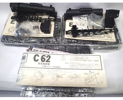 Three Otaki 1:50 scale Japanese locomotive plastic kits; C62 x1 and E10 x2, started, unboxed, appear complete, contents unche