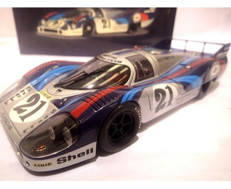 Auto Art 1:18 scale Porsche 917 long tail Martini racing in excellent condition and boxed, with display case. P&P Group 1 (£1