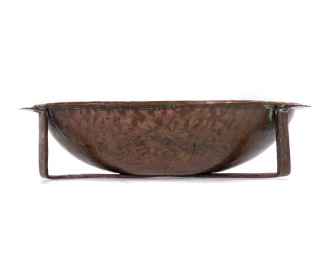 ENGLISH SCHOOL ARTS & CRAFTS HAMMERED COPPER BOWL,of circular form, raised on tripartite supports, marked 'K' to base, 22cm d