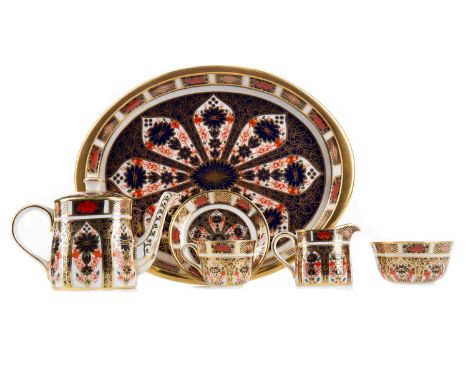 ROYAL CROWN DERBY IMARI MINIATURE INDIVIDUAL TEA SERVICE,comprising teapot, milk jug, sugar bowl, cup, saucer and tray, No. 1