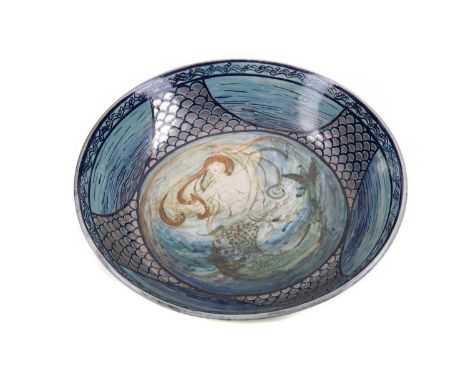 ARTS &amp; CRAFTS POTTERY BOWL,the central reserve hand-painted with a mermaid surrounded by a school of fish, within a silve