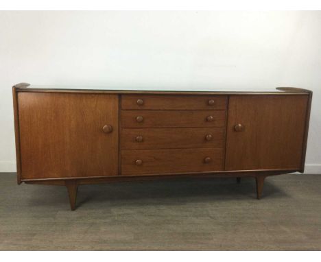 TEAK DINING SUITE BY A. YOUNGER LTD,comprising a glass-topped sideboard with twin doors each enclosing single shelf flanking 