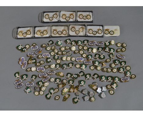 Over 100, in total Cradley Heath Speedway badges. [K]