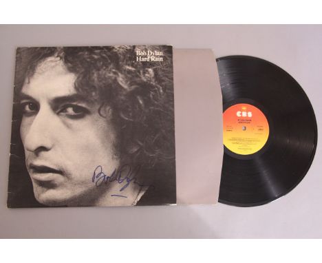 Bob Dylan signed LP Hard Rain CBS 86016 signed on the front cover in blue felt pen with inner in GD condition with four pages