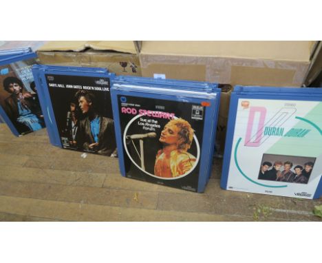 35 Laser Discs some sealed music related titles include - The Compleat Beatles, Roxy Music, Earth Wind & Fire, The Tubes, Elt