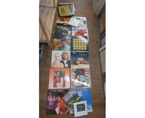 Collection of LP vinyl records and 7 inch singles LPs include Duane Eddy, Dela Reese, Elvis Presley, Four Tops, Nilsson, Shir