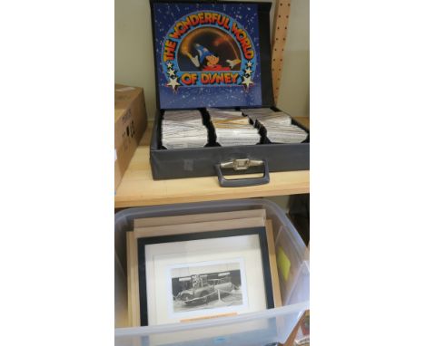 A box full of small framed photos including a Tony Hancock photo with signature, a photo of Steptoe & sons with printed signa