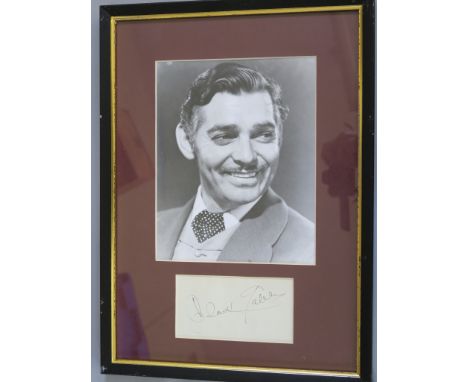 Clark Gable signature on paper, signed in black pen with black and white photo in frame. 13 x 18 inches (1) [M]
