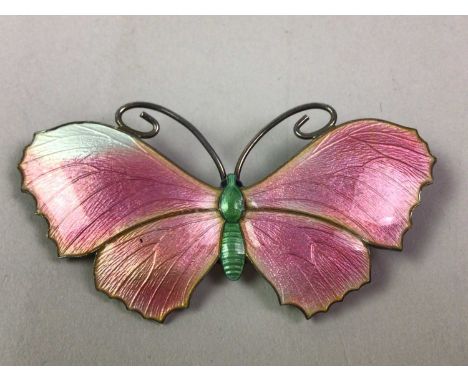 ART DECO SILVER BROOCH, EARLY 20TH CENTURY modelled in the form of a butterfly and decorated in pink and green guiloche ename