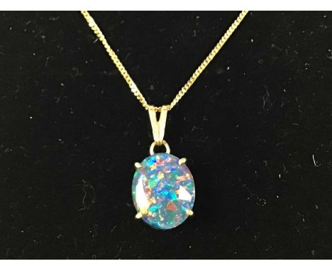 OPAL PENDANT ON CHAIN, the chain marked 375 for nine carat goldWeight of chain only is 1.49 grams. Weight of opal only is 1.2