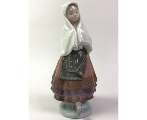 LLADRO FIGURE OF A GIRL, ALONG WITH A FIGURE GROUP OF FISH AND A HUMMEL FIGURE the Lladro figure modelled as a girl with shaw