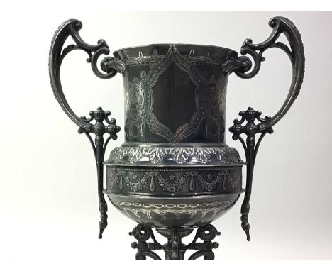 GROUP OF SILVER PLATED ITEMS, including a double handled prize cup, squat planter on three outset legs, oblong tea tray and a
