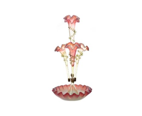 VICTORIAN VASELINE GLASS EPERGNE four cranberry tinted trumpets with trailed detail on circular base with crimped rim48.3cm h