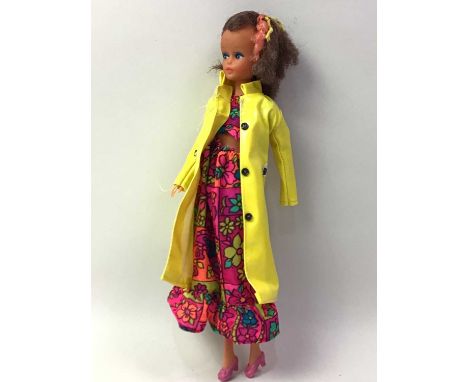GROUP OF THREE VINTAGE RUBBER HEAD DOLLS, along with accessories the tallest 28cm highThe doll in the main image does have so