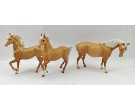 THREE BESWICK CERAMIC PALOMINO HORSES, two matt finished, one gloss finished (3) 