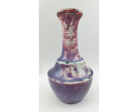 A RUSKIN POTTERY HIGH-FIRED STONEWARE VASE BY WILLIAM HOWSON TAYLOR, having turned flared rim neck, on waisted squat body, sa