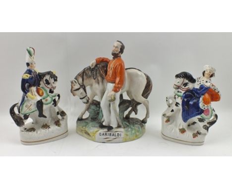 A 19TH CENTURY STAFFORDSHIRE CERAMIC FIGURE "Garibaldi" beside his horse, 23cm high, together with a PAIR OF LATE 19TH CENTUR
