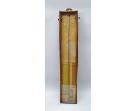 AN ADMIRAL FITZROY TYPE BAROMETER, in a mahogany framed case, with printed text background and fitted thermometer, overall si