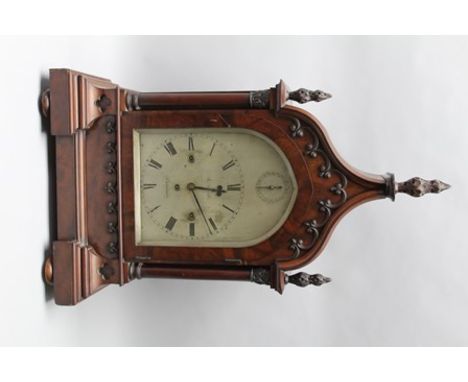 J. HOWLETT OF CHELTENHAM A 19TH CENTURY GOTHIC REVIVAL MAHOGANY CASED BRACKET CLOCK, the case with carved acanthus leaf finia