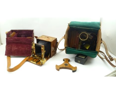 "ADAMS & CO., LONDON" A MAHOGANY BRASS MOUNTED PLATE CAMERA in leather carry case, with various lenses and slides 
