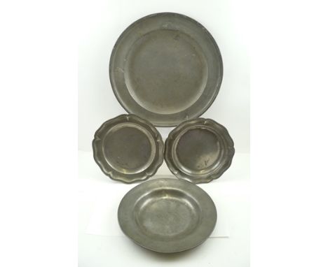 A PEWTER PLATTER, with touch marks to verso, 38cm, together with OTHER PEWTER PLATES 