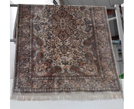 A hand knotted woollen Kashmir carpet, 189 x 122cm.