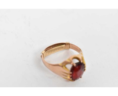 A 9ct yellow gold ring with red stone, size O, and a 9ct yellow gold ring with twelve small white stones, size K, combined ap