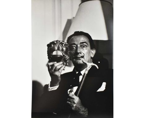 A large printed black and white photograph of Salvador Dali mounted on a sheet of metal, 119 x 79cm, unframed.