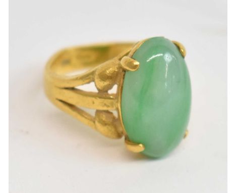 A Chinese jade set gold ring, size J, approx 9.4g.