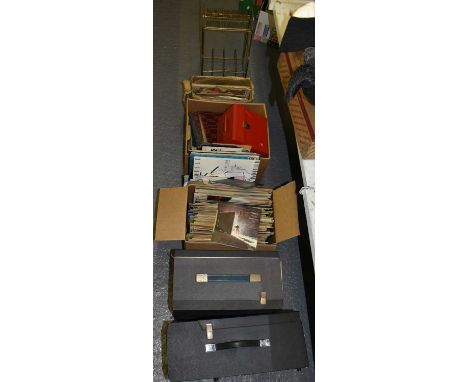 A large quantity of records and cd's, also a record player and amplifier.