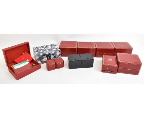 A collection of empty jewellery boxes including eight assorted Cartier boxes, Rolex and two Bulgari.