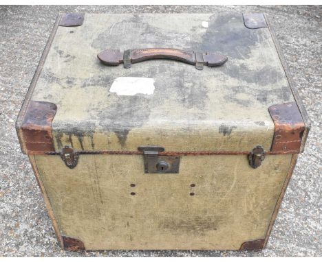 H GREAVES LTD; a leather bound travelling trunk with leather handle.