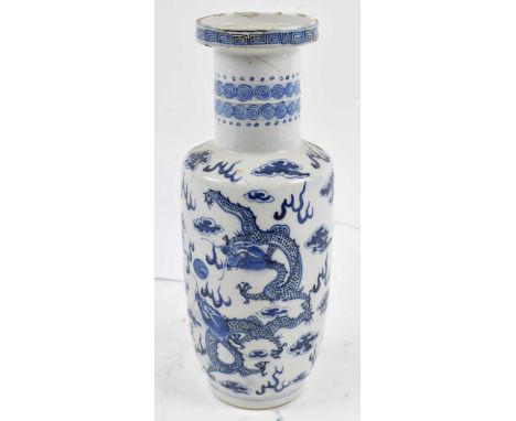 A19th century Chinese blue and white porcelain Rouleau vase, decorated with four claw dragons amongst clouds of pearl and wis