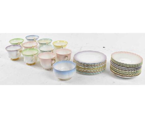 A group of ten Royal Albert 'Rainbow' patterned teacups and saucers, also a sugar bowl and twelve side plates.