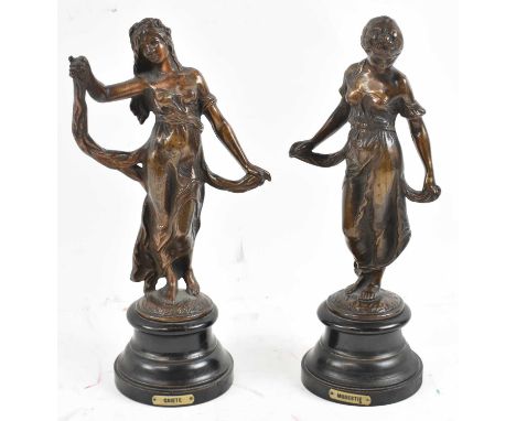 A pair of late 19th century bronzed metal figures 'Modestie' and 'Gaiete', on ebonised bases, height 29cm.