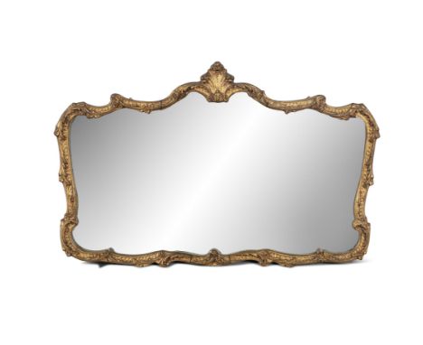 A GILTWOOD SHAPED RECTANGULAR WALL MIRROR, surmounted with a shell motif, the frame with scrollwork, 65.5 x 100cm