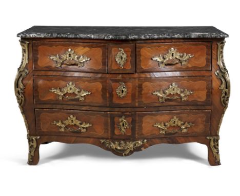 A FRENCH LOUIS XV TULIPWOOD, KINGWOOD AND MARBLE TOPPED COMMODE, of bombe shape, the dark mottled marble top, above two short