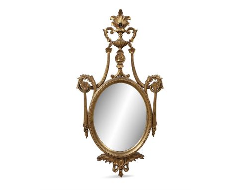 A GILTWOOD FRAMED OVAL WALL MIRROR, decorated with swags. 124 x 64cm