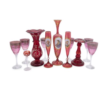 A PAIR OF BOHEMIAN RUBY CAMEO SLENDER VASES, with flared neck and baluster body, on circular foot; together with another came