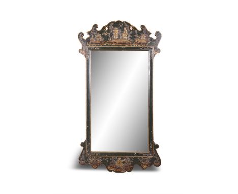 A BLACK AND GILT LACQUERED PIER MIRROR, c.1900 the rectangular glass plate, surrounded by a plain border, with carved crestin