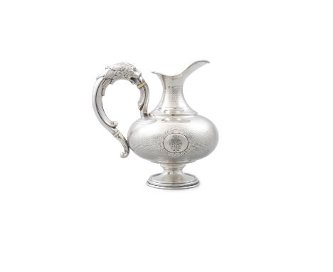 AN AUSTRIA-HUNGARIAN&nbsp;19TH CENTURY SILVER EWER, of squashed baluster form, with punched decoration, crested to one side, 