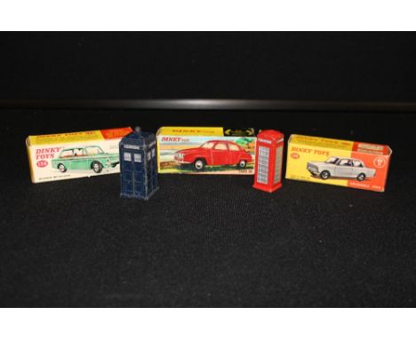 BOXED DINKY - a collection of three original boxed Dinky cars to include 138 a red metallic Hillman Imp Saloon, 156 a red met