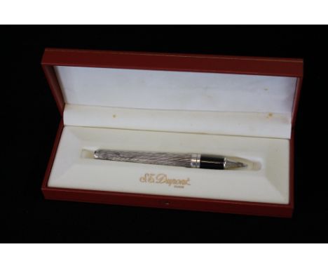 STERLING SILVER DUPONT - an 'Olympio' solid silver rollerball pen with original box and paperwork wallet including a ballpoin