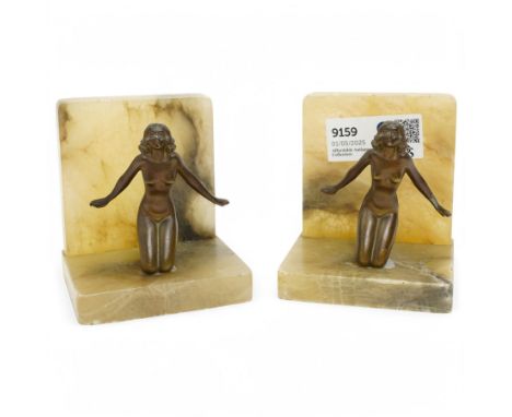 Pair of onyx bookends with bronze female figures