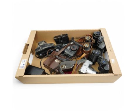 Bell and Howell filmo double run eight model 134-C cinecamera in leather case, Carl Zeiss Jena telex 6X24 binoculars, and var